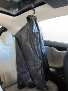Tesla Model S coat hook with leather bomber jacket