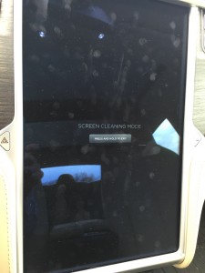 Griffin-Screen-Cleaning-Tesla-Model-S-Dirty-Screen - TESLARATI