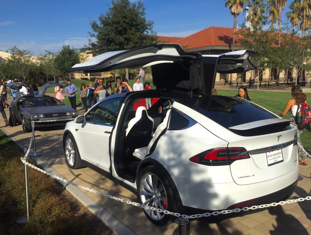 DeLorean gull wing doors vs Tesla Model X falcon wing doors at STVP Future Fest [Source: Facebook via Steve Jurvetson] 