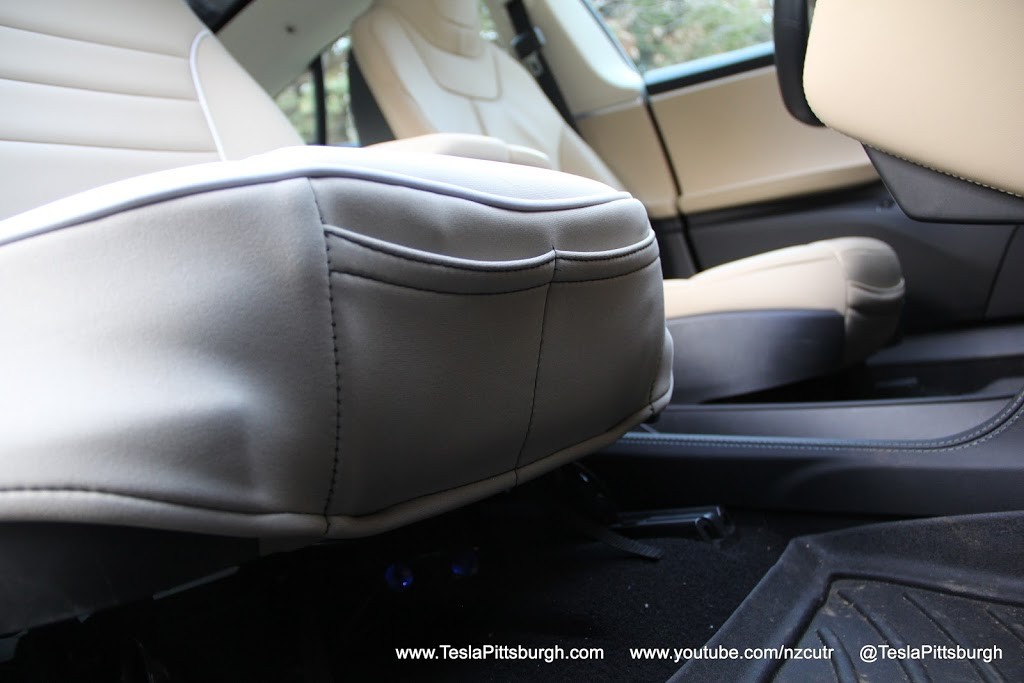 Model S front seat covers with storage