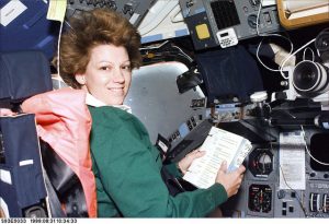 Eileen Collins flexing her commanding skills in space.