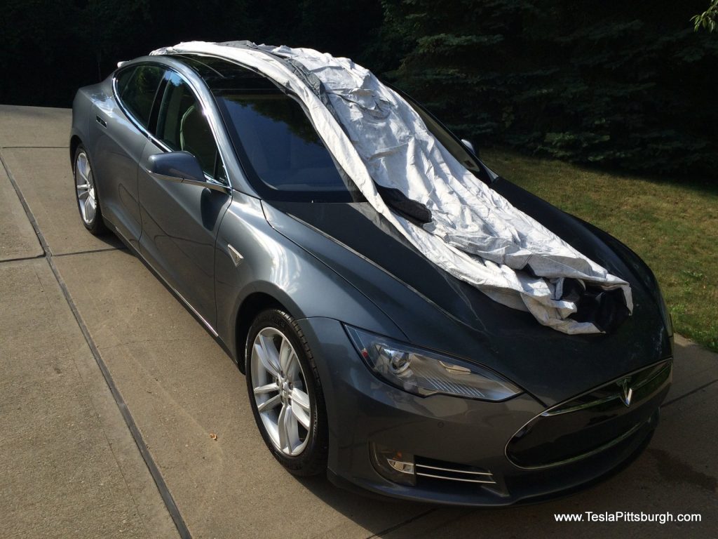 Unfolding the Tesla Model S car cover
