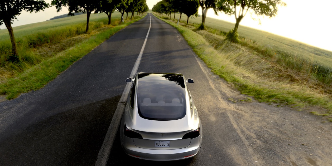 Silver-Tesla-Model-3-open-road