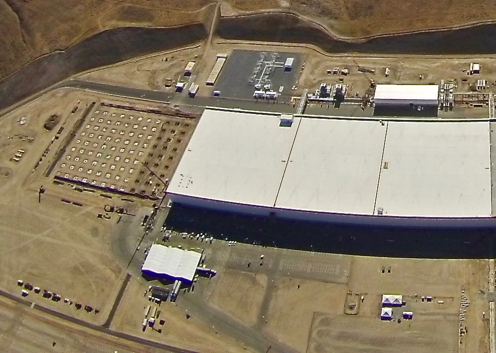 A newly perched white tent is seen near the entrance to the Gigafactory