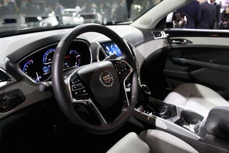 The interior of a 2013 Cadillac SRX Crossover is shown at the 2012 New York International Auto Show at the Javits Center in New York, April 5, 2012. REUTERS/Allison Joyce/Files