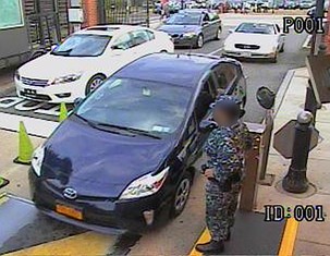 WASHINGTON, DC – SEPTEMBER 16: In this handout frame grab from the Washington Navy Yard provided by the FBI on September 25, 2013, Aaron Alexis drives his rental car, a blue Toyota Prius, through the Washington Navy Yard main gate September 16, 2013 in Washington, DC. The FBI investigation indicates that the gunman, Aaron Alexis, acted under the delusion that he was being controlled by extremely low frequency (ELF) electromagnetic waves when he carried out his attack on the Navy Yard, in which 12 people were killed and 4 were wounded.