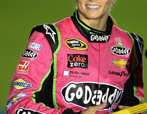 CONCORD, NC – OCTOBER 10:  Danica Patrick, driver of the #10 GoDaddy Breast Cancer Awareness Chevrolet, stands on the grid during qualifying for the NASCAR Sprint Cup Series Bank of America 500 at Charlotte Motor Speedway on October 10, 2013 in Concord, North Carolina.