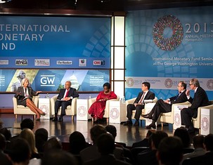 WASHINGTON, DC – OCTOBER 9:  In this handout provided by the International Monetary Fund (IMF), IIMF/World Bank Annual Meetings hosts the Program of Seminars: Taxing Times with panelists: Christine Lagarde (L), Managing Director, IMF; Alan Auerbach (2nd R), Robert D. Burch Professor of Economics and Law, University of California, Berkeley; Maria Kiwanuka (3rd L), Minister of Finance, Uganda; Fernando Aportela Rodriguez (3rd R), Minister of Finance, Mexico; Pravin Jamnadas Gordhan (2nd L), Minister of Finance, South Africa and moderator: Tom Keene (R), Editor-at-Large, Bloomberg Television and Radio October 9, 2013 at the IMF Headquarters in Washington, DC. The report said that emerging-market governments were at economic risk.