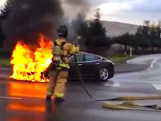 /imag/businessinsider/2013/10/08/a-jefferies-analyst-raised-her-price-target-on-tesla-days-after-a-car-caught-on-fire.jpg