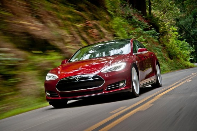 Tesla model S red on road
