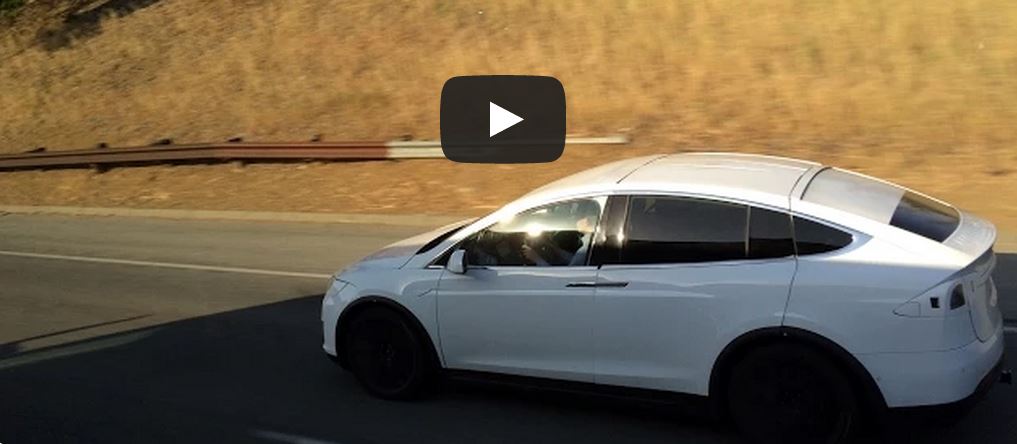 Tesla Model X undergoing lane departure test on the freeway