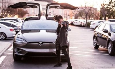 Jaden Smith poses with Tesla Model X