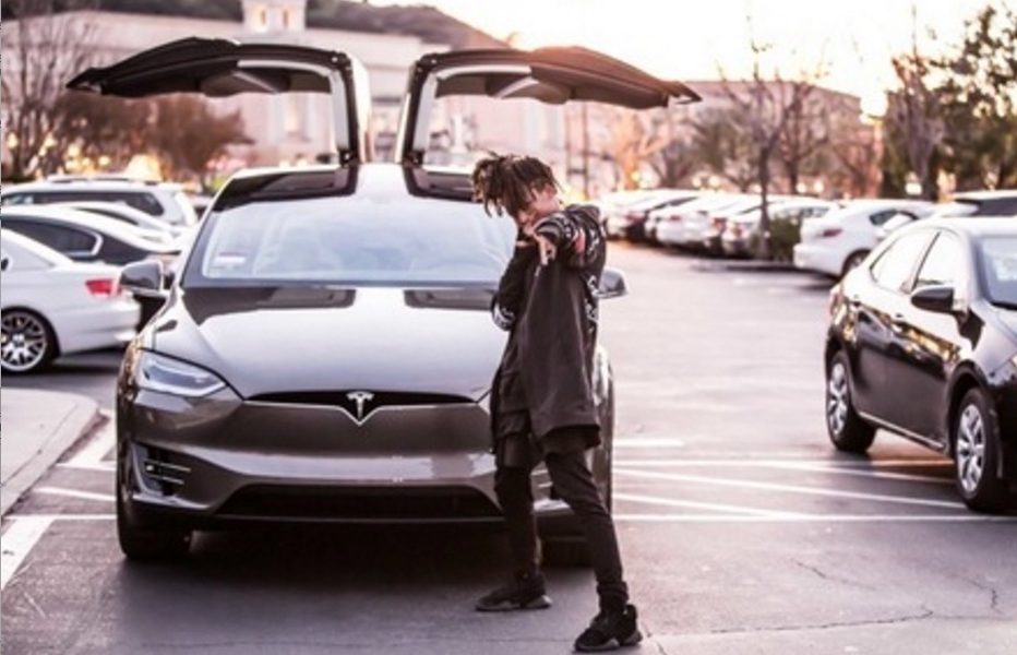 Jaden Smith poses with Tesla Model X