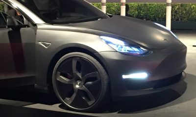 Matte Black Tesla Model 3 with low profile tires