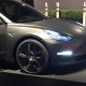 Matte Black Tesla Model 3 with low profile tires