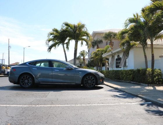 Tesla Model S and palm trees