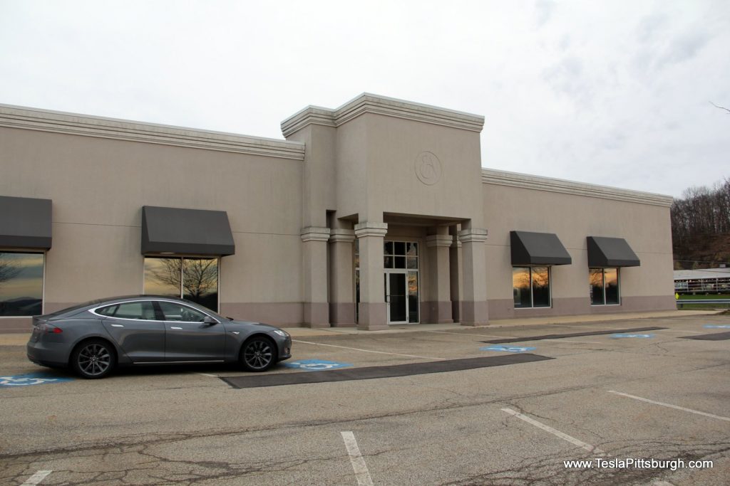 pittsburgh tesla service main facade with plugr in