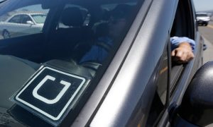 uber logo on windshield