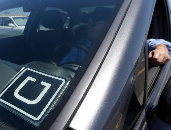 uber logo on windshield