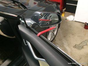 prying off the front door panels to install speakers tesla pittsburgh