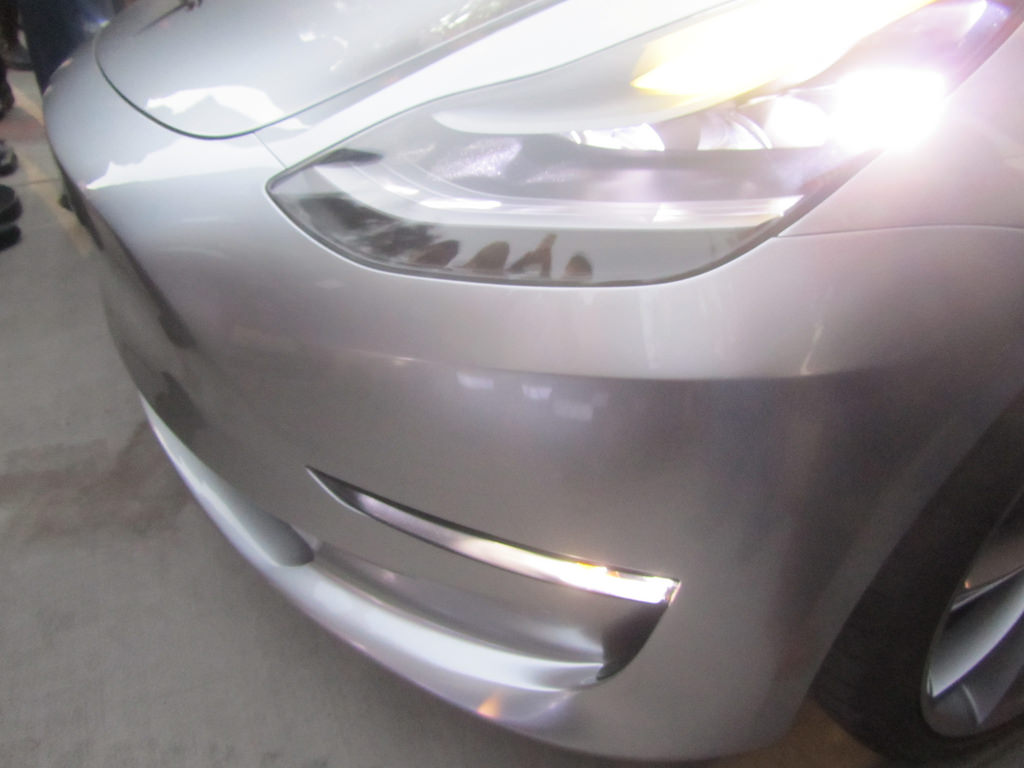 Silver Tesla Model 3 headlight