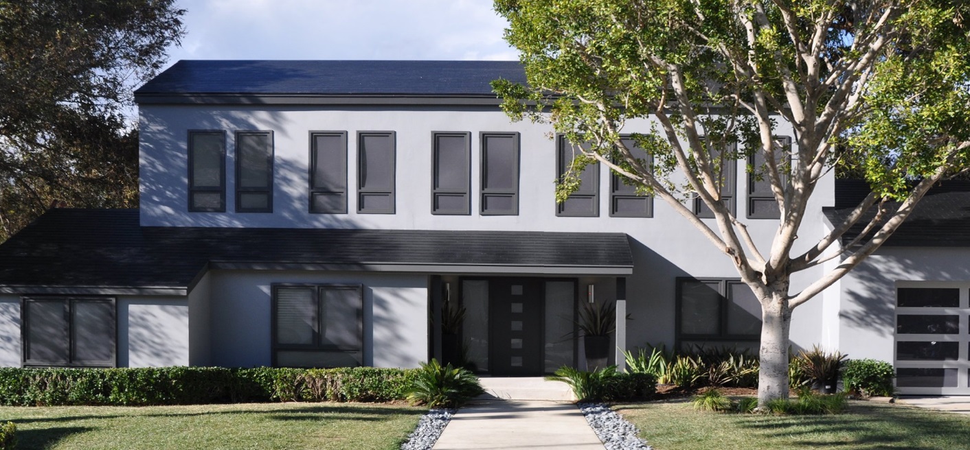 tesla-solar-roof-smooth-glass-tile-house