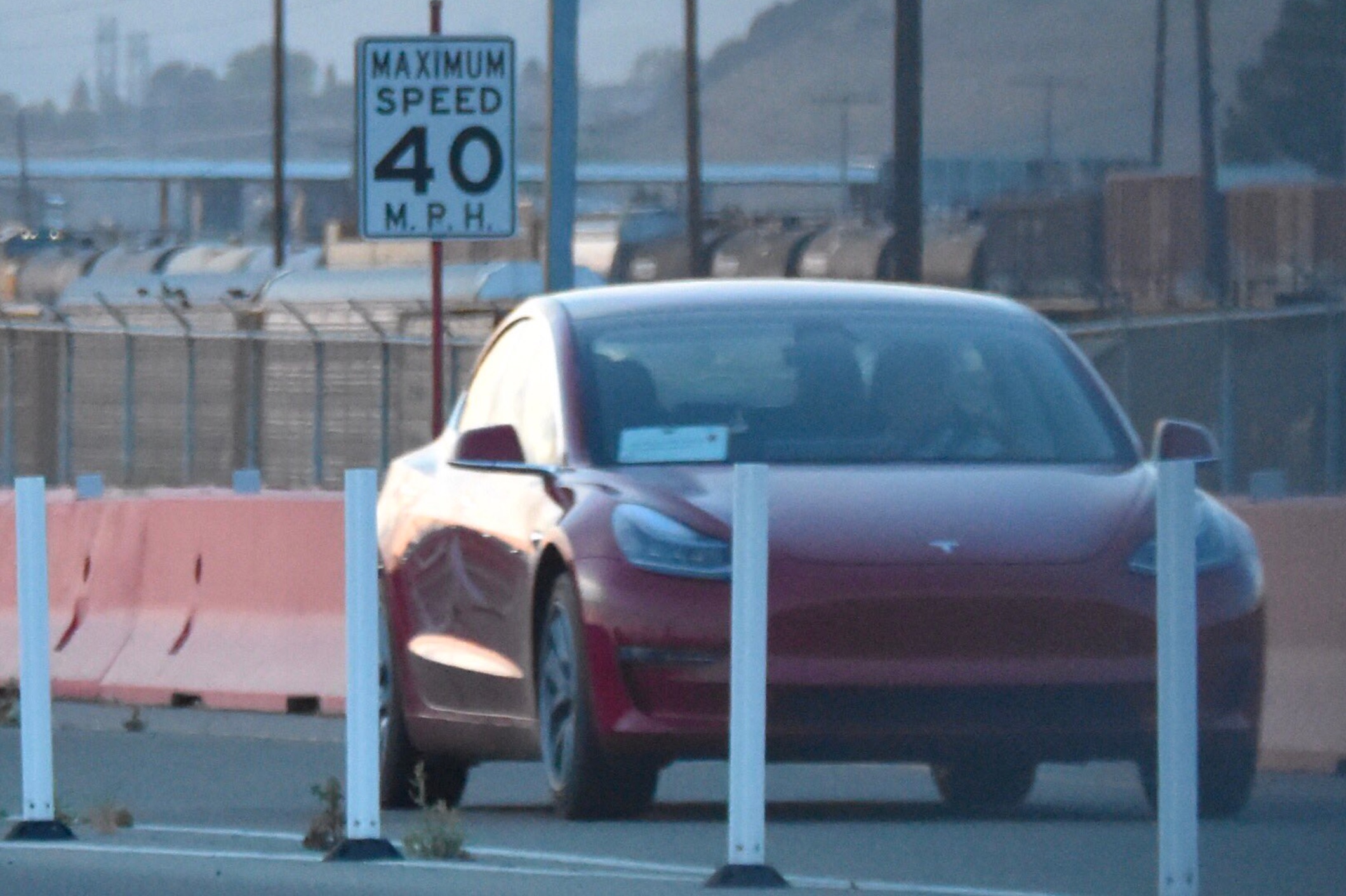 Red Tesla Model 3 at the Fremont Factory test track [Credit: Tesla Owners Club BE]