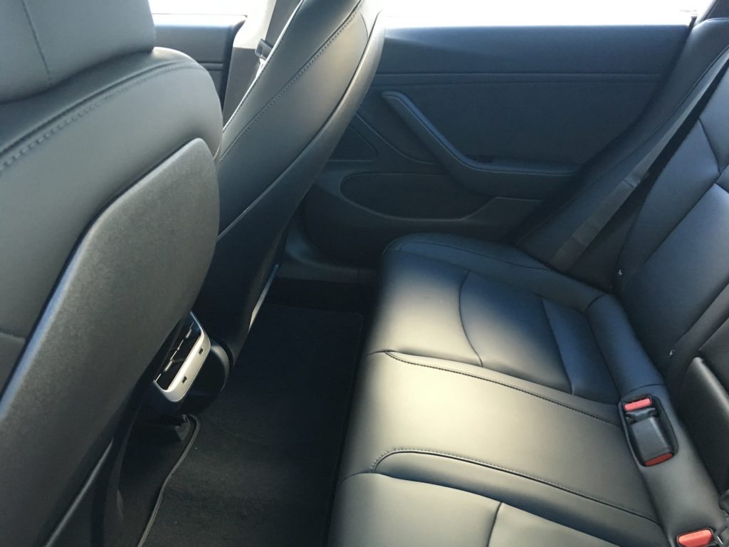 Tesla model s clearance rear seat legroom