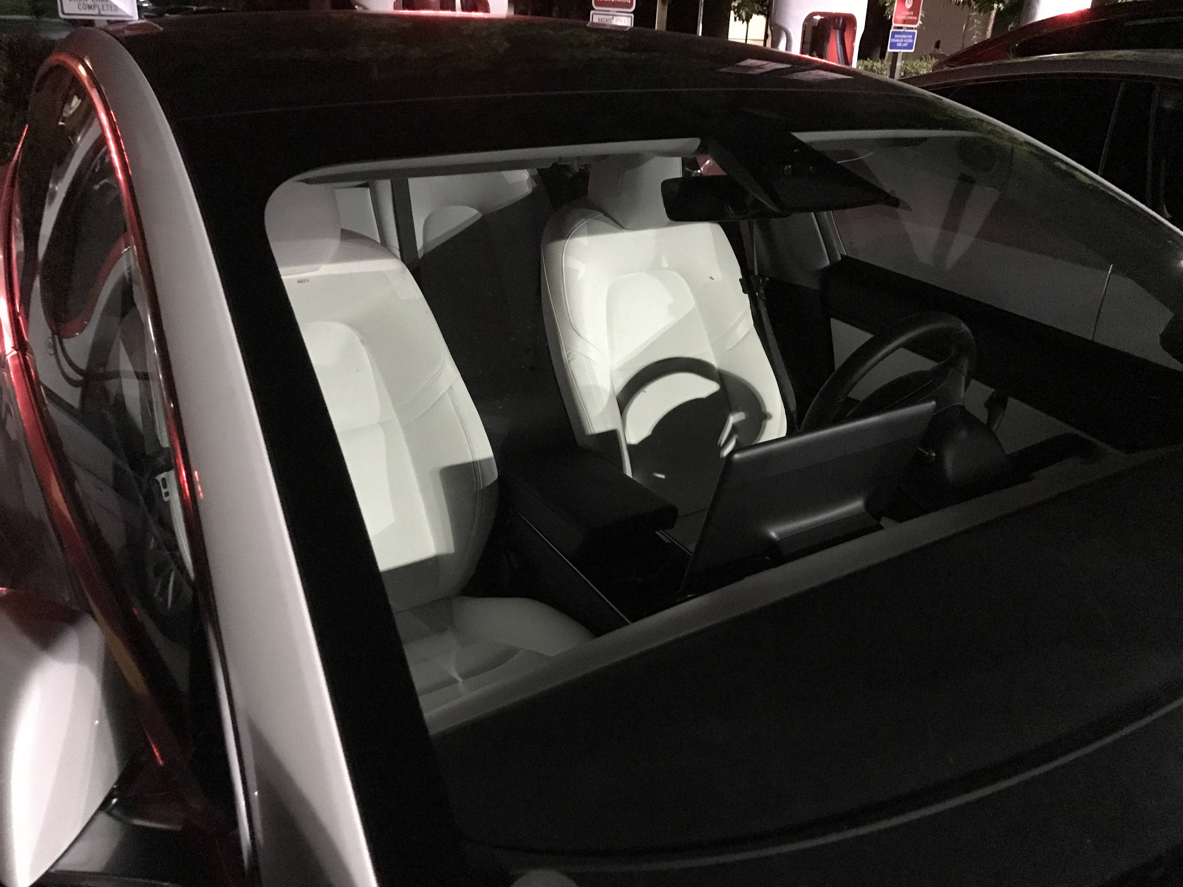 Tesla Model 3 with white seats