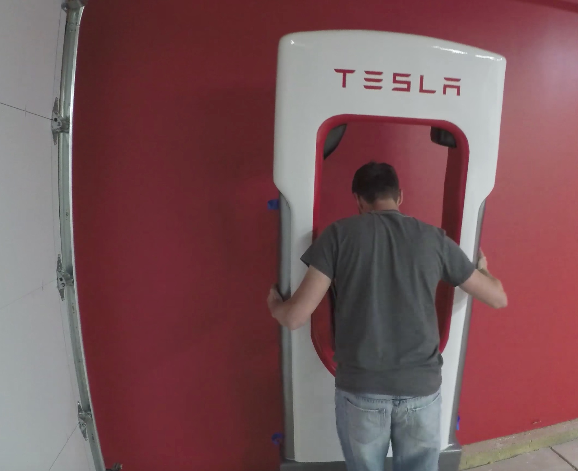 Tesla owner builds a working life size Supercharger for his garage