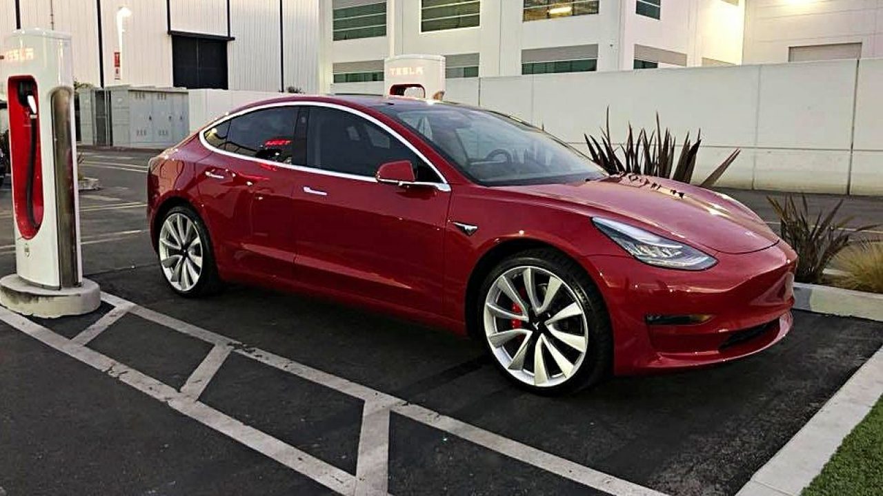 tesla model 3 red jordan