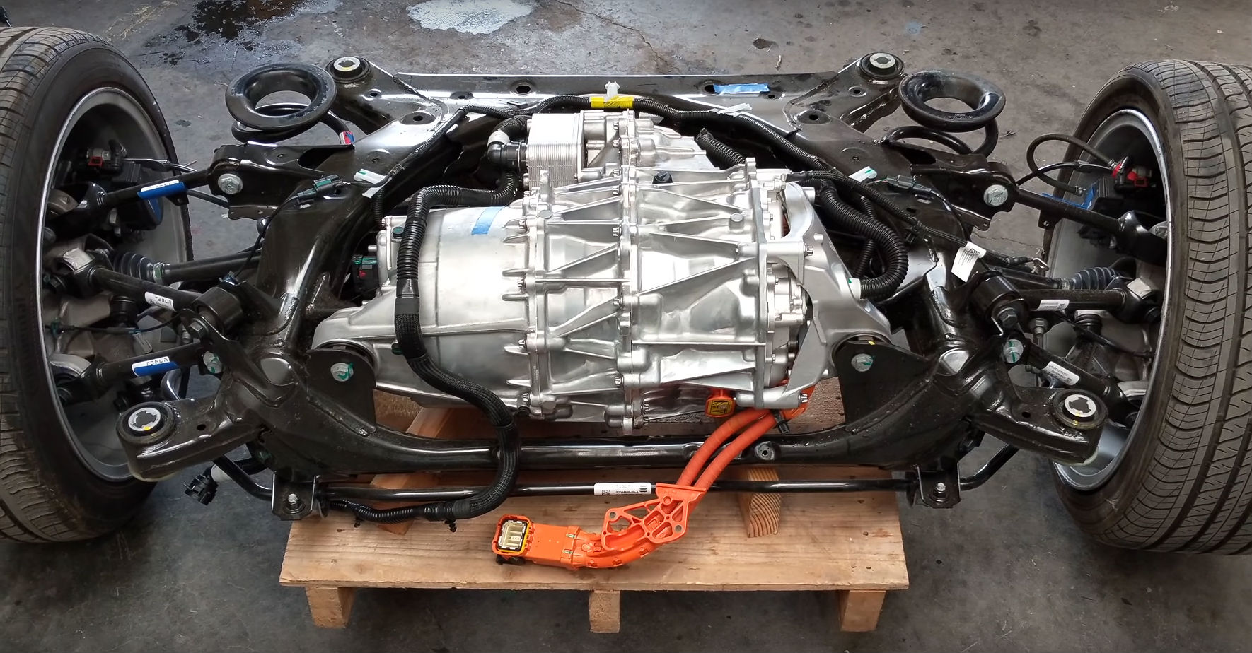 Tesla s Model 3 electric motor is a clever mystery box 