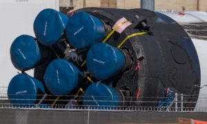 SpaceX's third Block 5 Falcon 9 booster shows off its well-worn octaweb and Merlin engines after a successful launch debut and recovery. (Pauline Acalin)