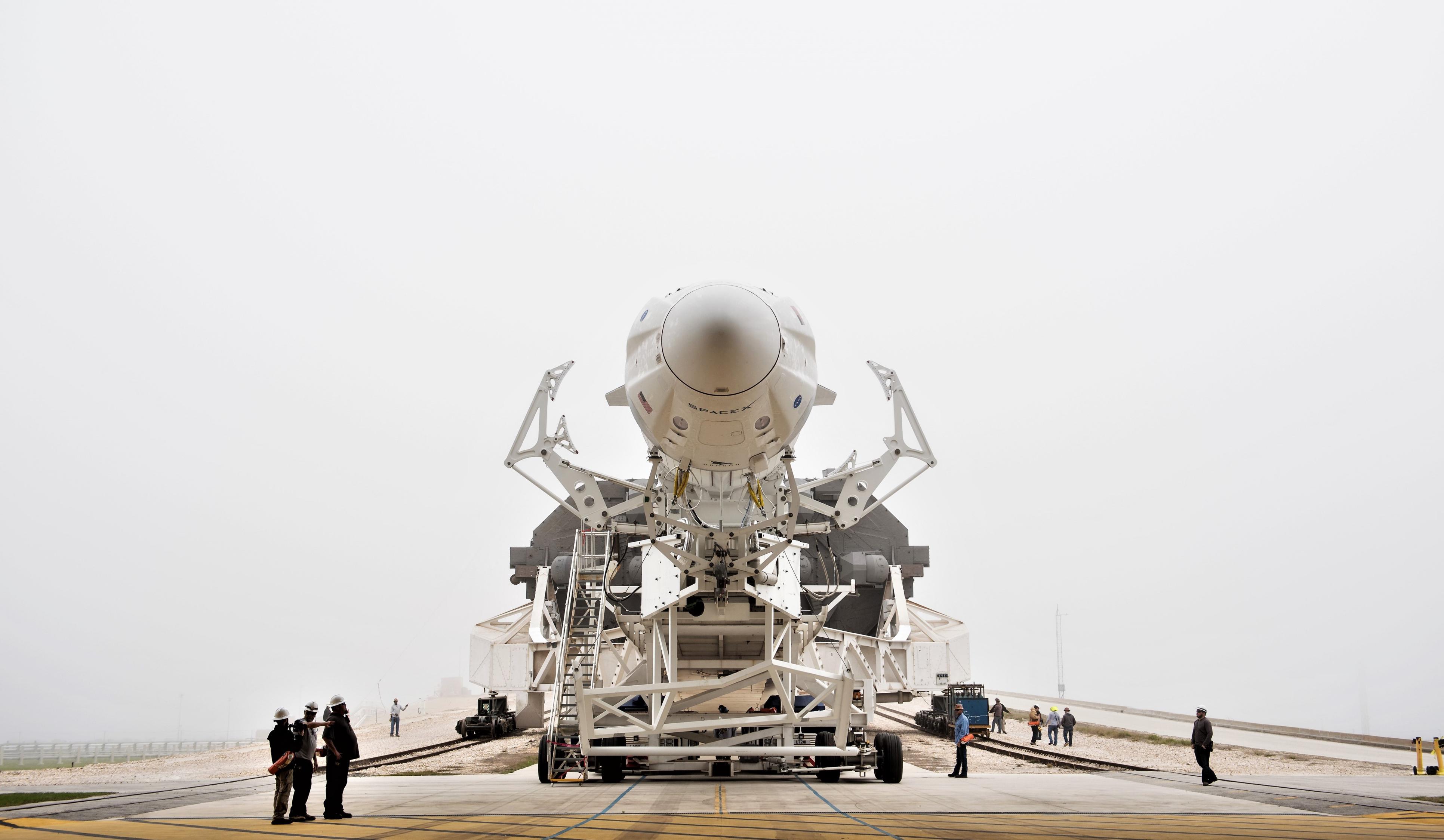 Crew Dragon Falcon 9 DM-1 39A rollout 022819 (NASA – Joel Kowsky) 3 edit (c)