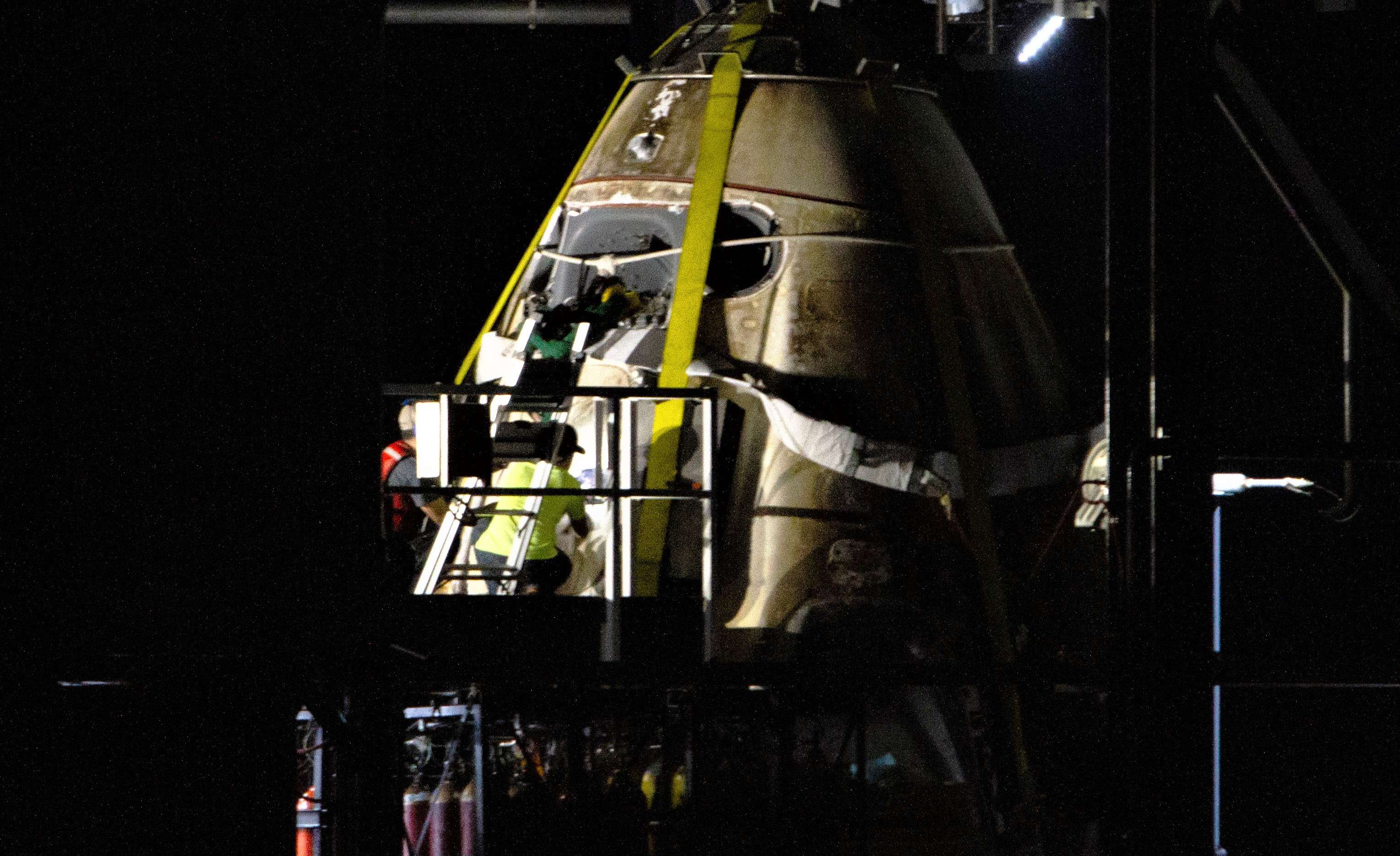 Crew Dragon DM-1 capsule port return 031019 (Tom Cross) detail 1 edit (c)
