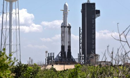 Falcon Heavy Flight 3 made use of both flight-proven side boosters and a new center core. Note the scorched landing legs and sooty exteriors. (SpaceX)