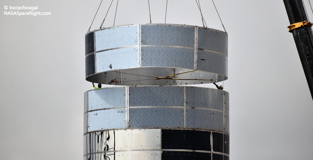 SpaceX technicians install one of Starship Mk1's final ring sections on August 7th. On September 14th, a similar milestone took place with a combined ring and tank dome. (NASASpaceflight - bocachicagal)