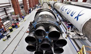 Chances are good that one of the three Falcon 9 boosters to the right is assigned to SpaceX's next launch, its first orbital mission in more than three months. (SpaceX)