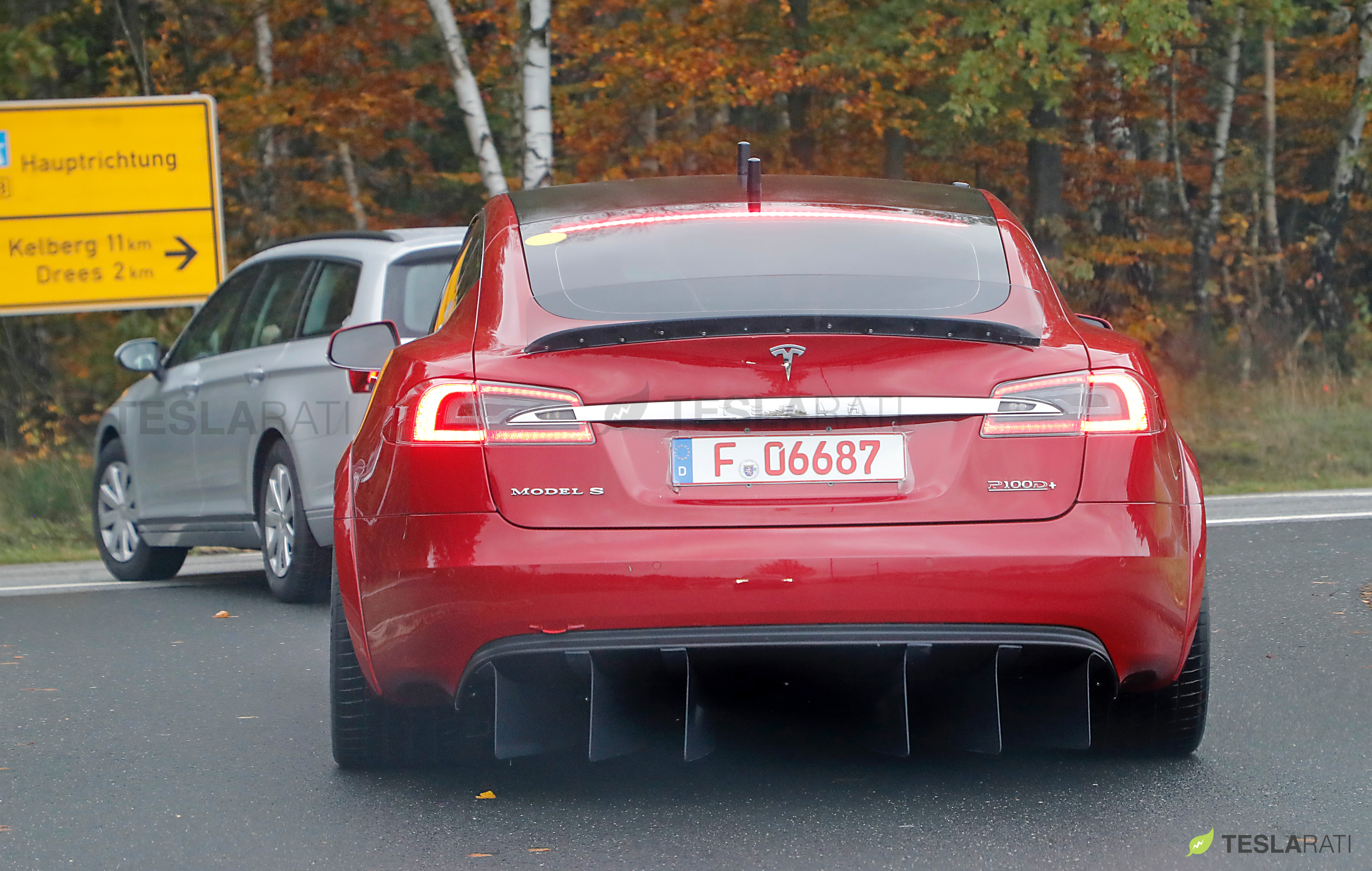 Red Tesla Model S P100D+ badge