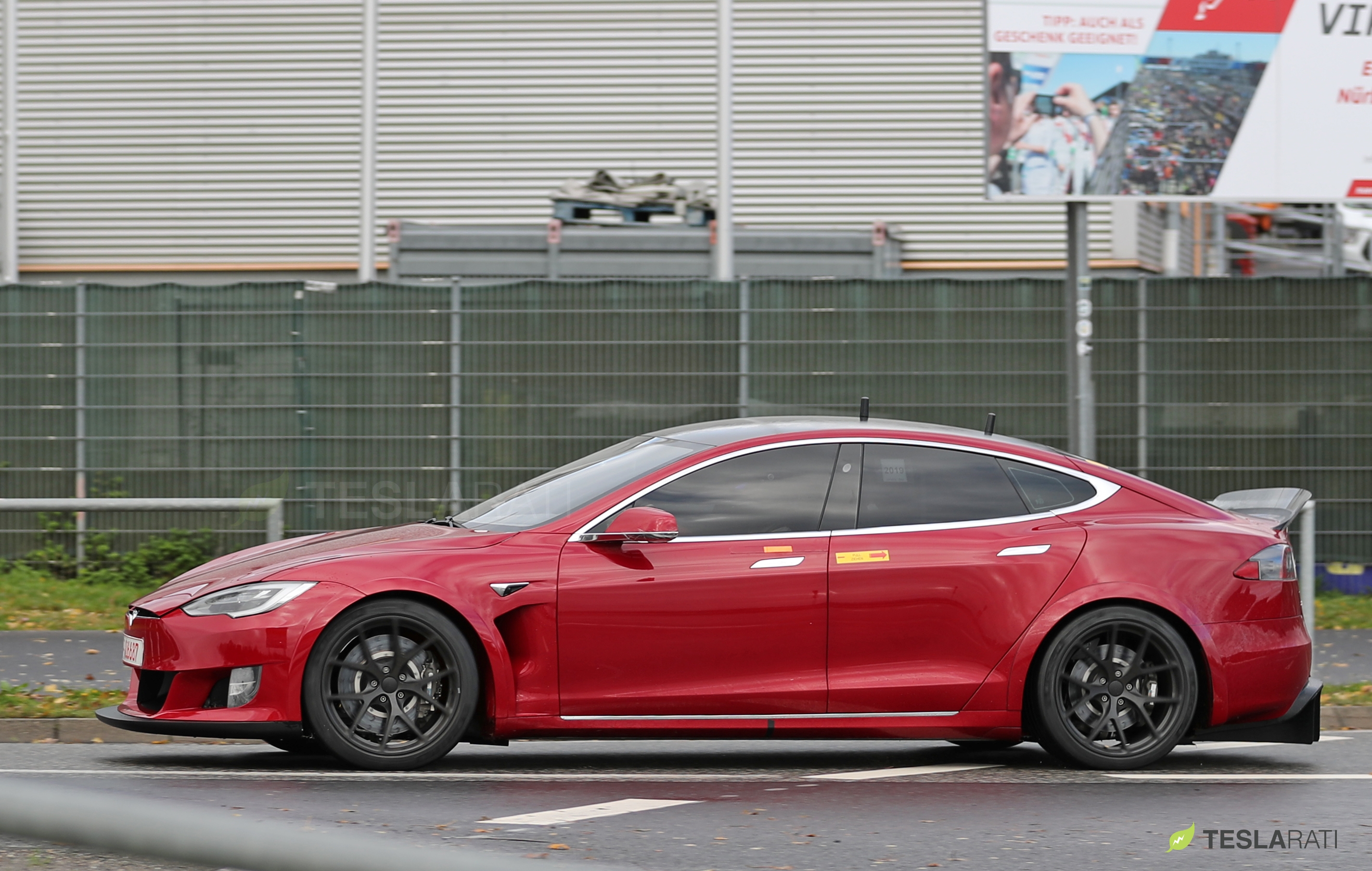 tesla model s red side view