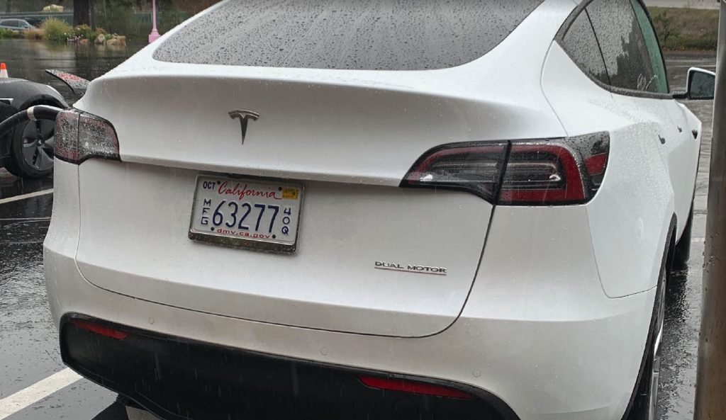 Red tesla shop emblem model y