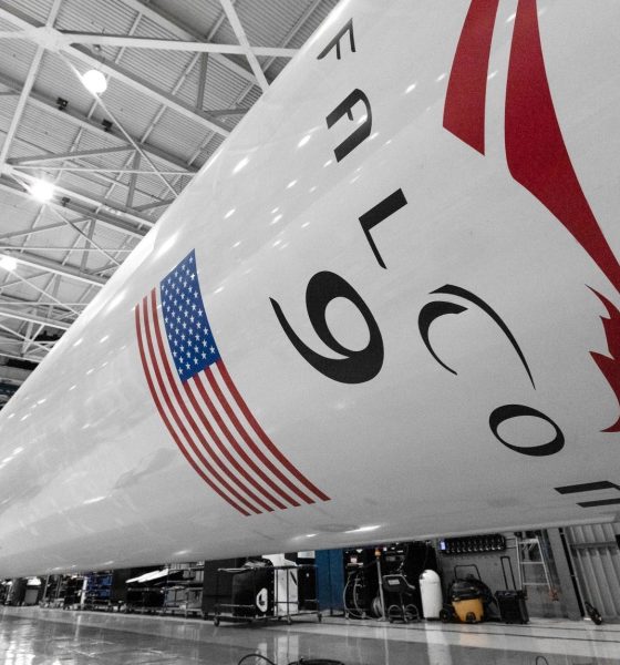 Space Force officials say the Falcon 9 booster pictured here in SpaceX's rocket factory will have to wait a few months longer for its launch debut. (SpaceX)
