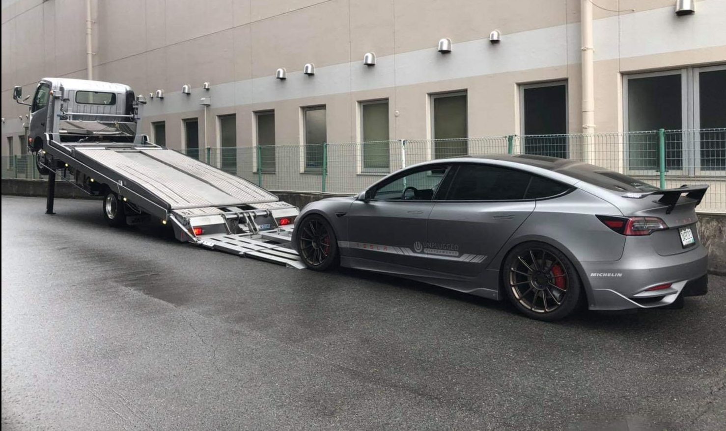 Tesla Model 3 race-tuned by Unplugged heads to historic Tokyo Auto Salon  exhibit