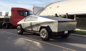 Elon Musk with Tesla Semi and Cybertruck at the Design Center Supercharger station in Hawthorne, CA