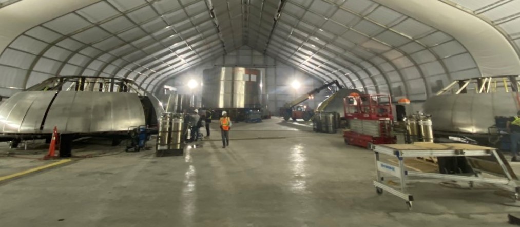 photo of Elon Musk reveals SpaceX Starship production well underway inside new Texas factory image