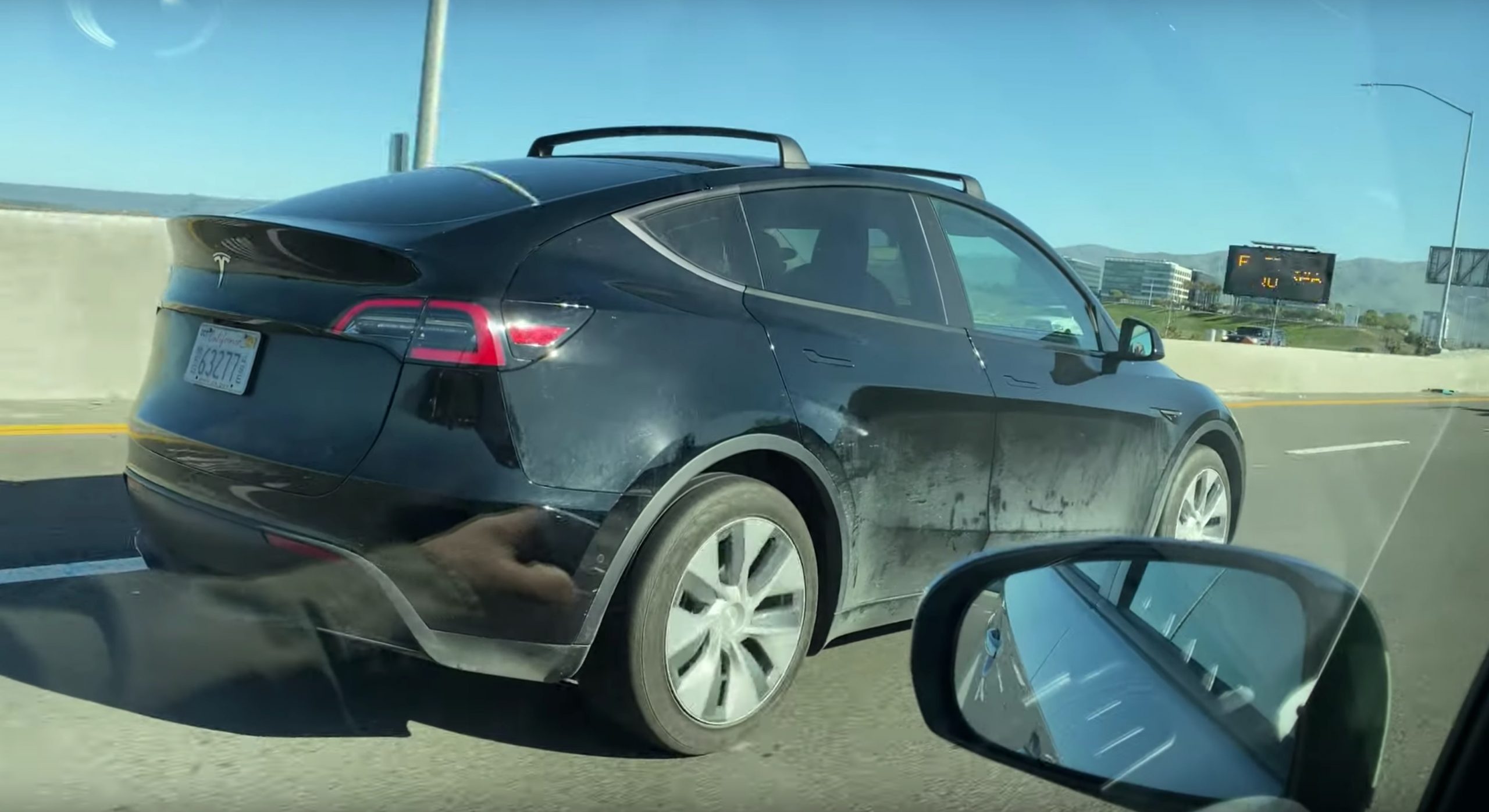 Tesla Model Y spotted testing with roof racks installed