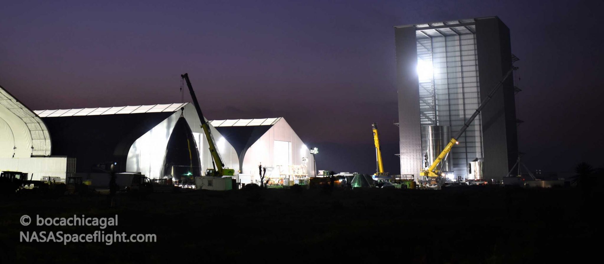 https://www.teslarati.com/wp-content/uploads/2020/03/Starship-Boca-Chica-031920-NASASpaceflight-bocachicagal-tents-VAB-overview-1-crop-c-2048x898.jpg