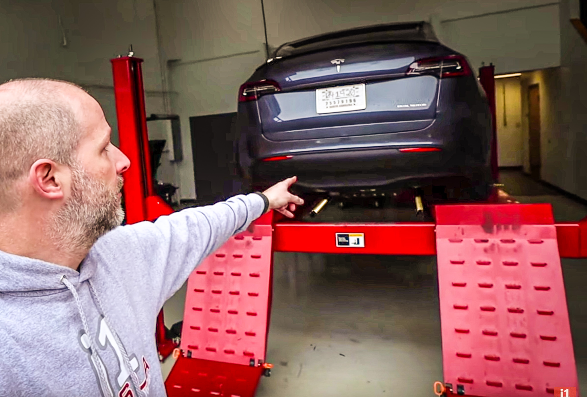 Tesla Model Y trailer hitch cover plate reveals room for towing down