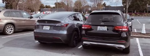 Tesla Model Y side by side with Mercedes SUV highlights