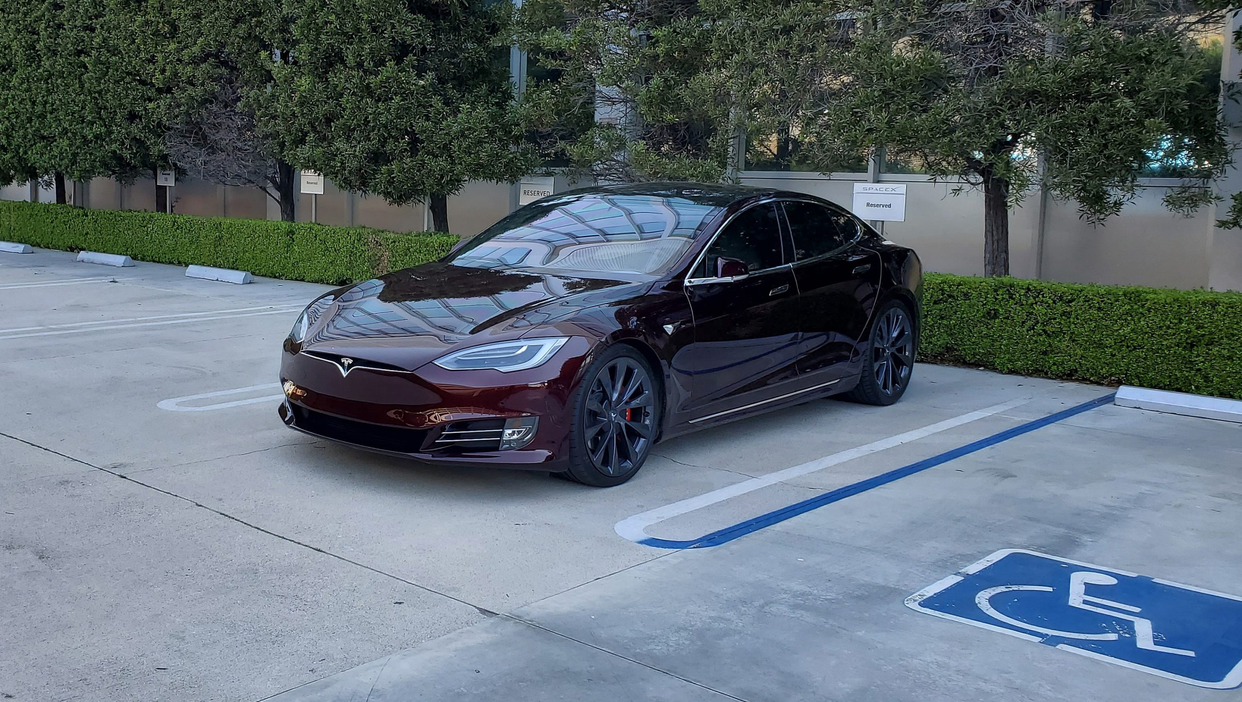 Tesla Model S with cryptic 'deep crimson' paint spotted at SpaceX  headquarters